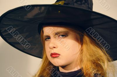 young girl as witch