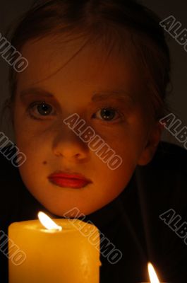 young girl and candle