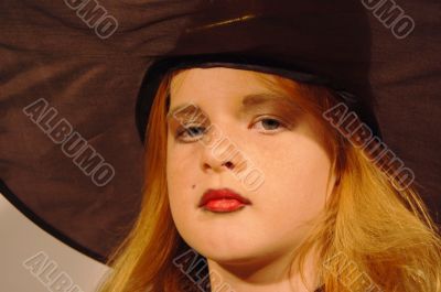 young girl as witch