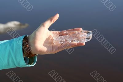 Ice on palm of girl