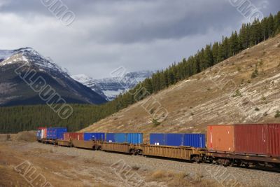 Freight train hauling up the Rocky Mountains