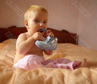 Little girl with her boots