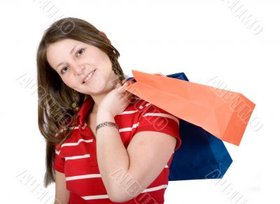 beautiful teenager with shopping bags