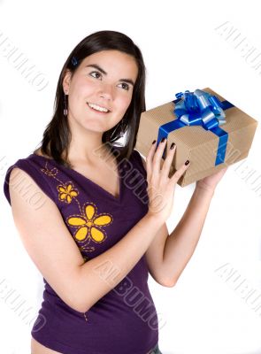 girl wondering what she got for a gift