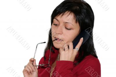 woman in office is calling by phone