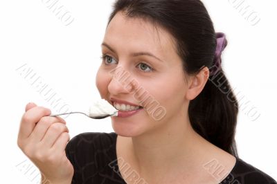 woman eats yoghurt