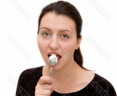 woman eats yoghurt