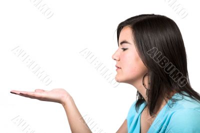 girl looking at her hand