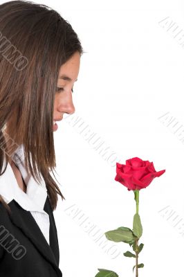 business girl admiring rose