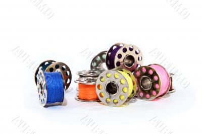Pile of colorful thread spools