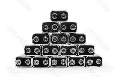 Nine volt batteries forming a pyramid