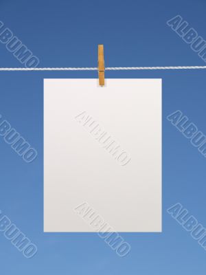Blank paper sheet on a clothes line (+2 clipping paths)