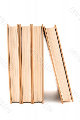 Four books on white background