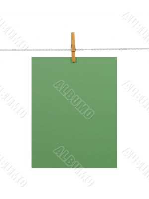 Green paper sheet on a clothes line (+2 clipping paths)