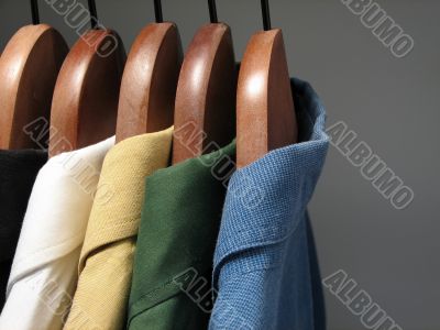 Colorful shirts in a closet