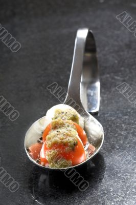 Amuse bouche with cherry tomato