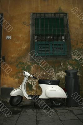 White scooter on the street