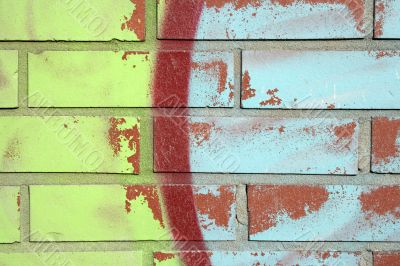 Colorful graffiti on a brick wall