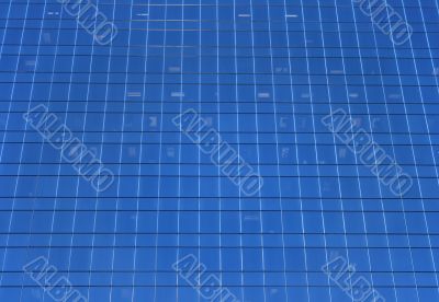 Glass-windowed wall of skyscraper