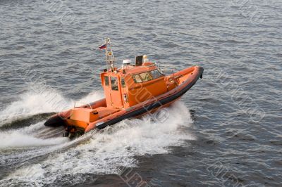 Orange speed-boat