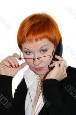 Businesswoman working, holding a cellphone and glasses
