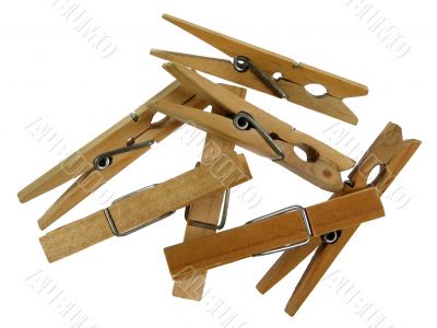 Wooden clothespins on white background