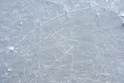Skate marks on the surface of an outdoor ice rink