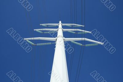 White electricity pylon and the blue sky