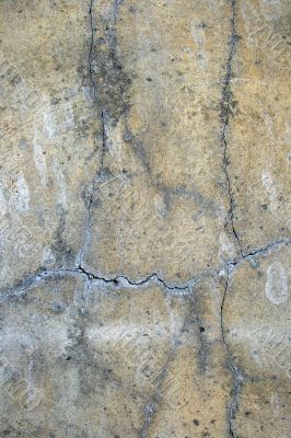 Old cracked concrete wall: grunge background