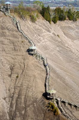 Wooden stairs on mountain slope