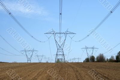 Electricity pylons in farmland