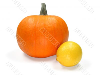 Pumpkin and lemon on white background (+ clipping path)
