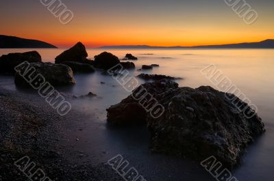 Rocky beach at dusk