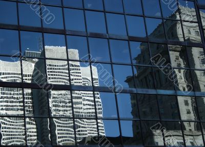 Reflections of modern buildings