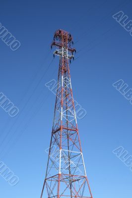 Top of the red and white electricity pylon