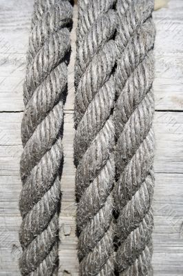 Boat rope on wooden background