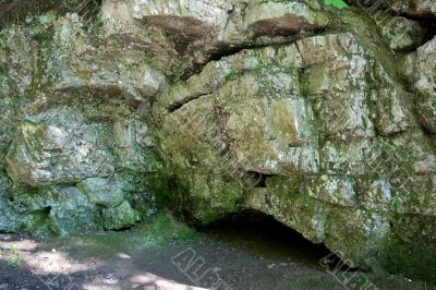 Little cave in a mossy rock