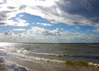 The shiny sea and cloudy sky