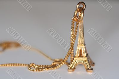 small gold souvenir of eiffel tower