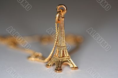 small gold souvenir of eiffel tower