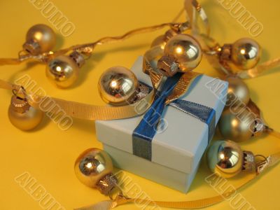 Blue gift box with golden balls