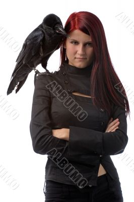 young witch with raven