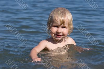 child and sea