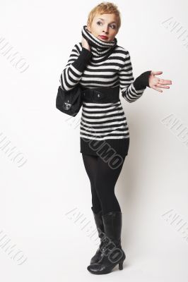 Nice blondgirl standing with black bag