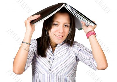 female student with book on head