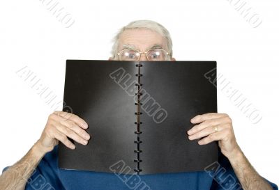 casual teacher with black notebook