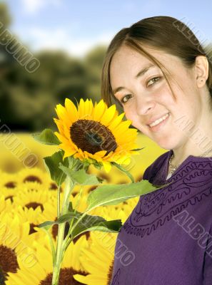 beautiful girl in sunflower field