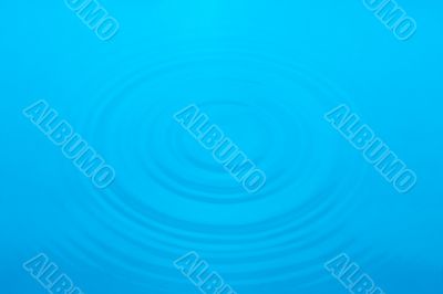 rings in blue water