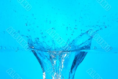 big blue splashing water