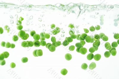 peas splashin into the water